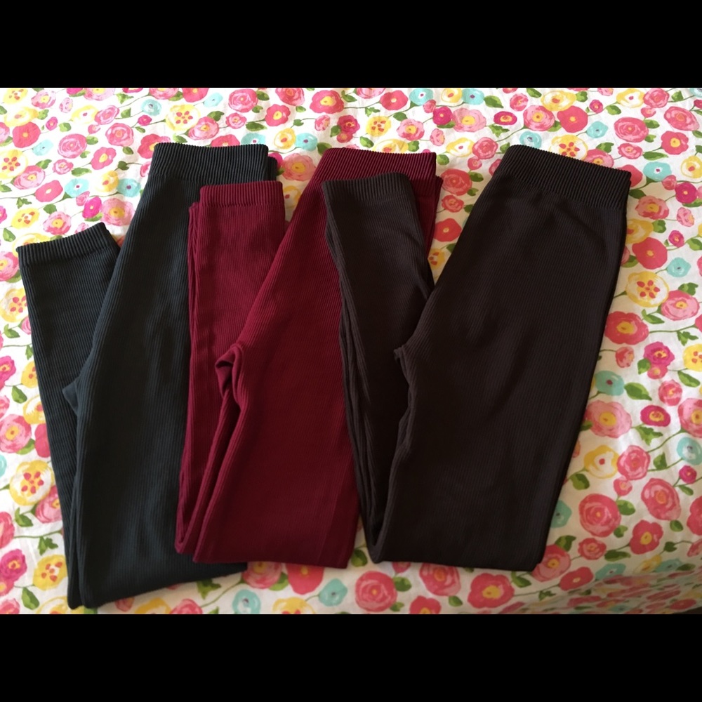 Three pair of gold medal fleece lined leggings